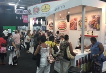 Busy stand with promo staff working